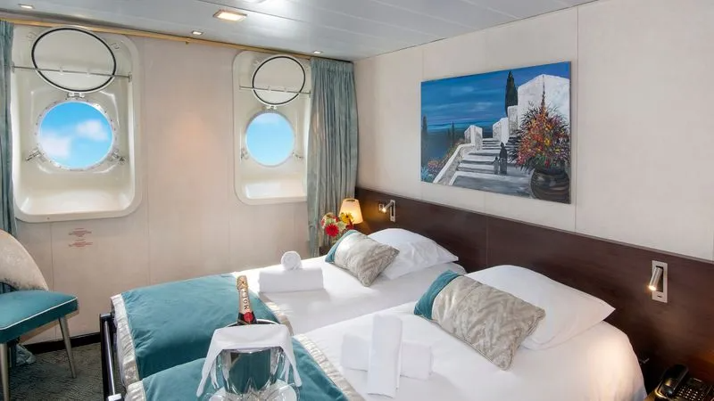 MAIN DECK 2 SEPARABLE BEDS-WINDOW CAT B