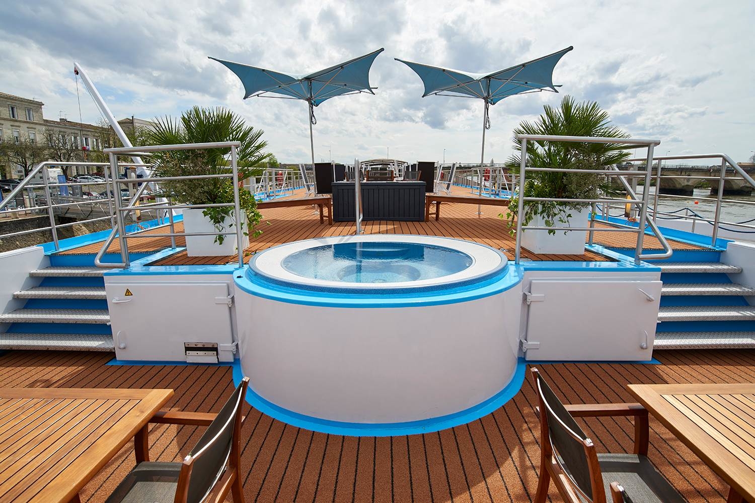 Sun deck whirlpool and heated pool aboard the AmaDolce with vineyard views