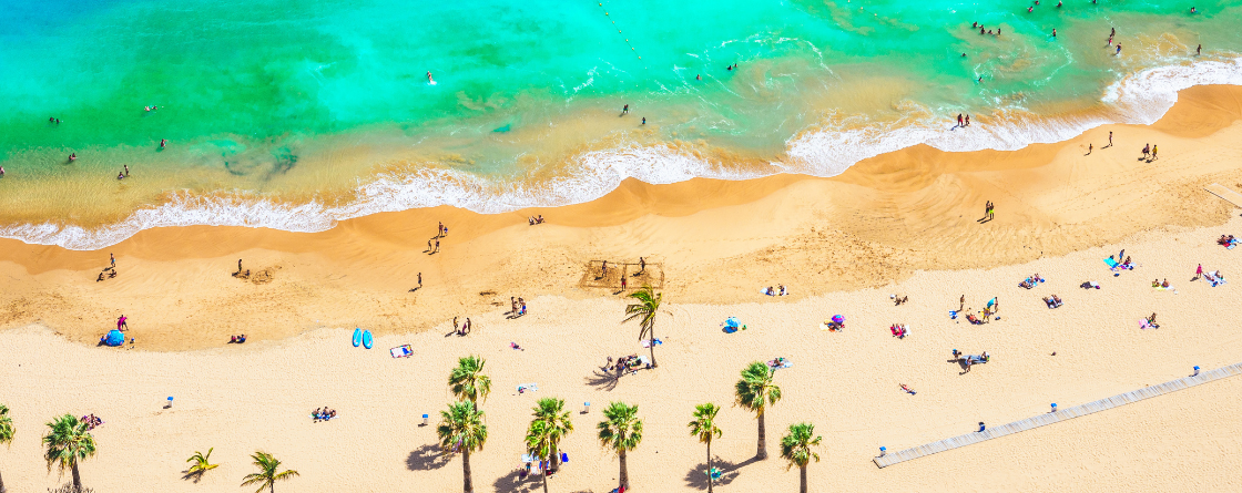 Canary Islands beach with turquoise water during sunny day